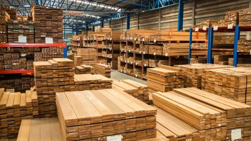 Piled lumber near a lumber mill waiting for shipping